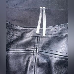 Black vegan leather short sleeve dress